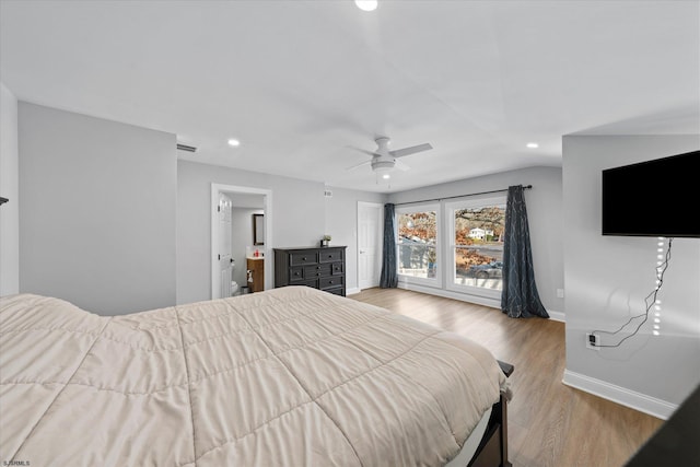 bedroom with ceiling fan and light wood-type flooring