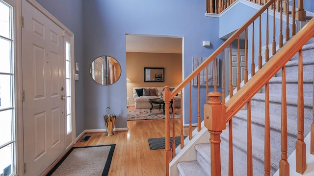 entrance foyer featuring hardwood / wood-style floors