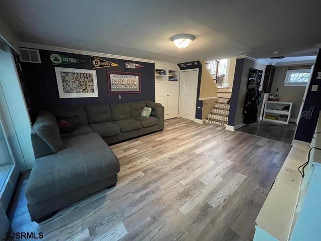 living room with wood-type flooring