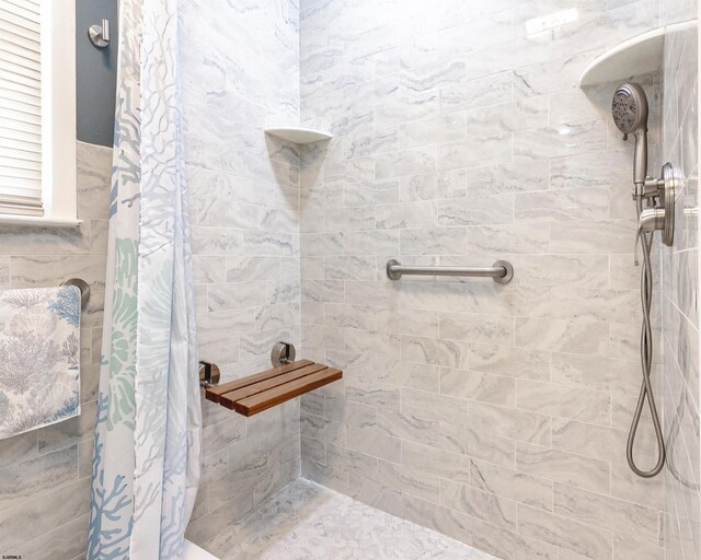 bathroom featuring walk in shower