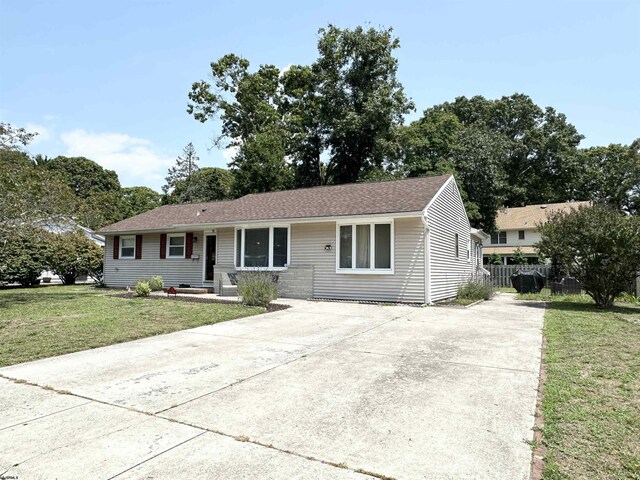 ranch-style house with a front yard