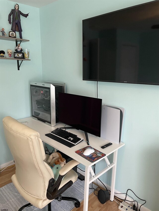 home office featuring hardwood / wood-style floors