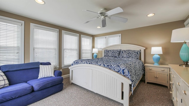 carpeted bedroom with recessed lighting, multiple windows, and ceiling fan