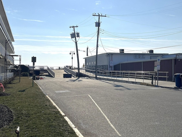 view of car parking with fence