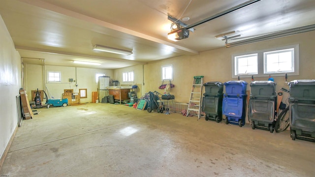 garage featuring a garage door opener