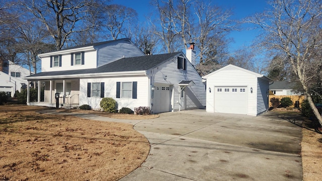 view of side of home with covered porch and a garage