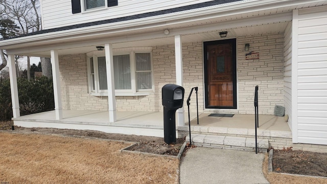 entrance to property with a porch