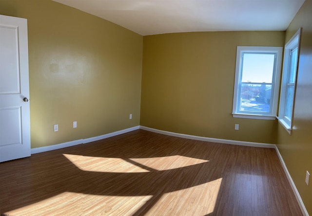 unfurnished room featuring wood-type flooring