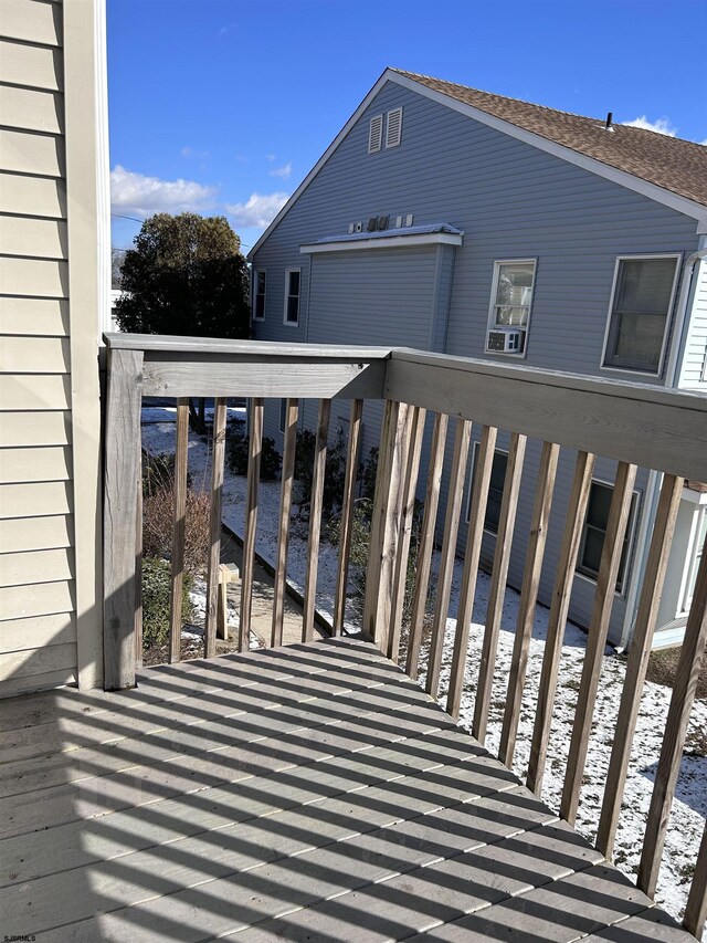 view of snow covered deck