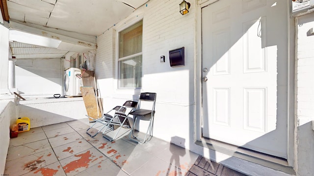 view of patio featuring a porch