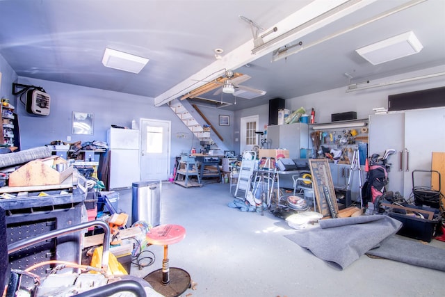 garage featuring white fridge