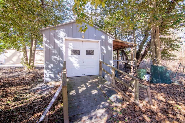 view of outbuilding with a garage