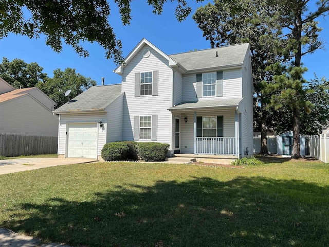 view of front of house featuring a garage, covered porch, and a front lawn