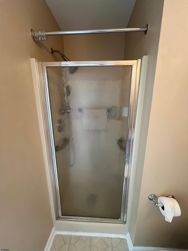 bathroom with an enclosed shower