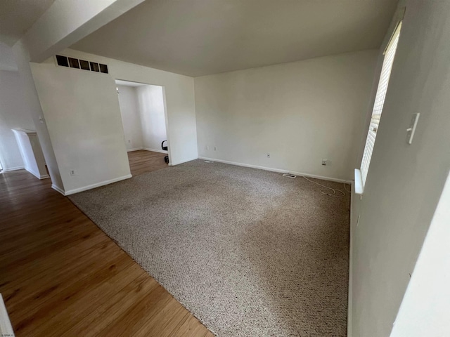 empty room with wood-type flooring