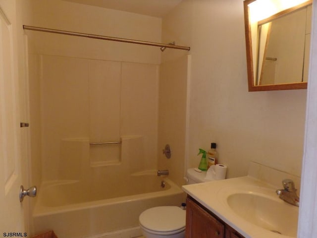 full bathroom featuring vanity,  shower combination, and toilet