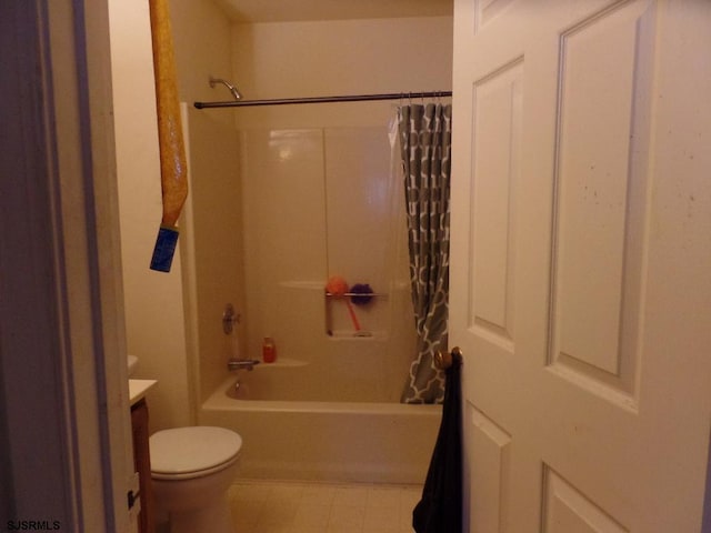 full bathroom with vanity, shower / bath combination with curtain, and toilet