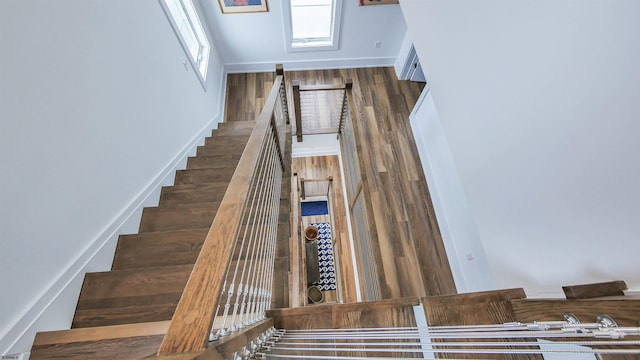 staircase with a high ceiling