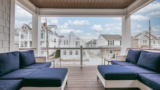 wooden deck with an outdoor hangout area