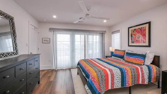 bedroom with dark wood-type flooring and ceiling fan