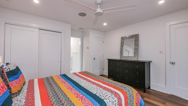 bedroom featuring dark hardwood / wood-style flooring and ceiling fan