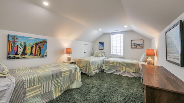 bedroom featuring vaulted ceiling and carpet floors