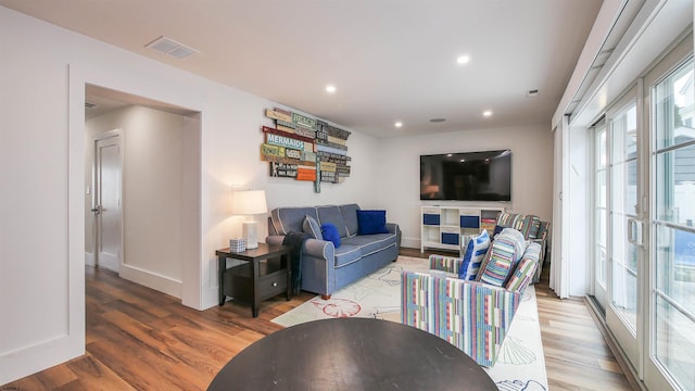 living room with hardwood / wood-style floors