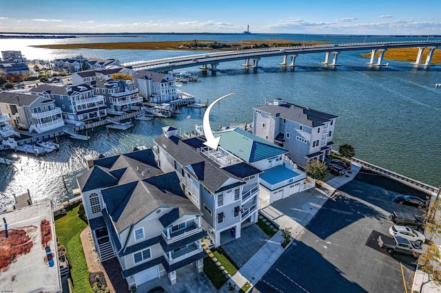 bird's eye view with a water view