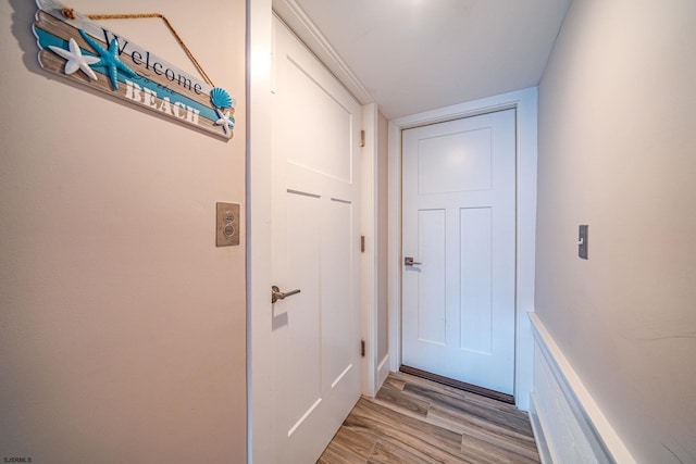 entryway with light hardwood / wood-style floors