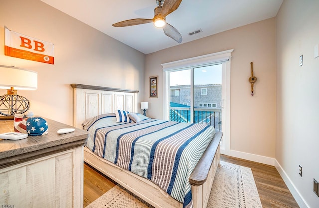 bedroom featuring wood-type flooring, access to exterior, and ceiling fan