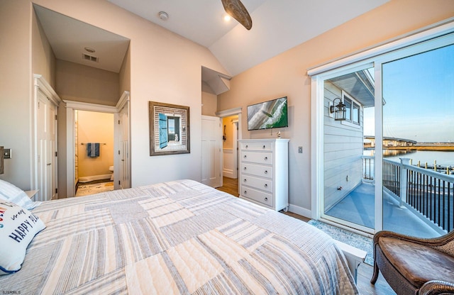 bedroom featuring vaulted ceiling, ensuite bathroom, access to exterior, and ceiling fan