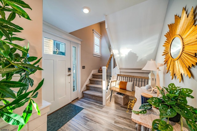 foyer with light hardwood / wood-style floors