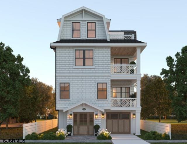 view of front facade with a balcony and a garage