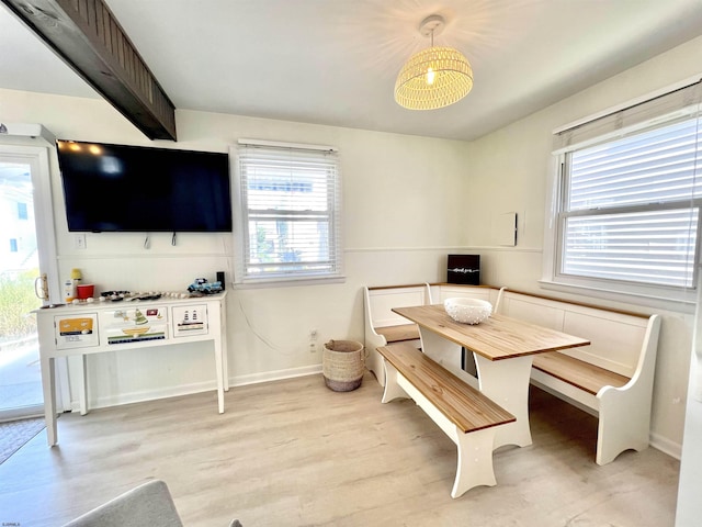 dining space with breakfast area and light wood-type flooring