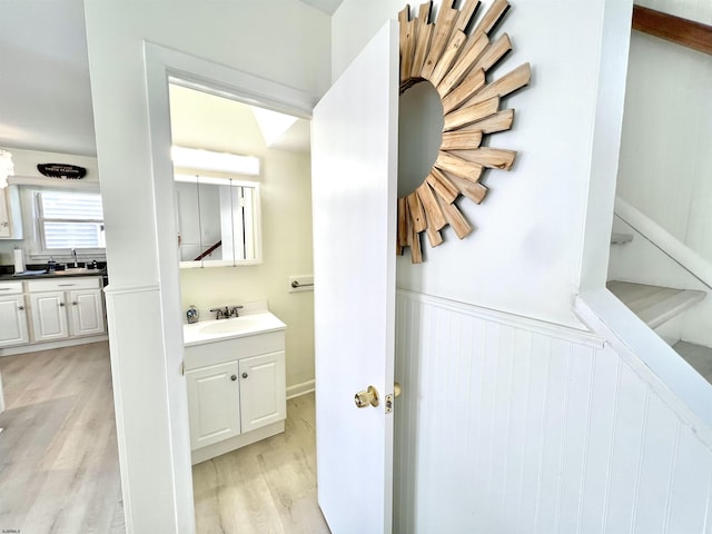 bathroom featuring vanity and wood-type flooring