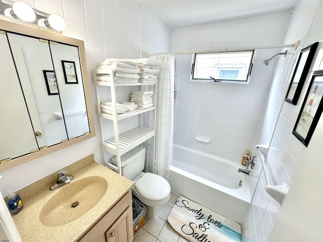 full bathroom featuring tile walls, shower / tub combo, vanity, tile patterned floors, and toilet