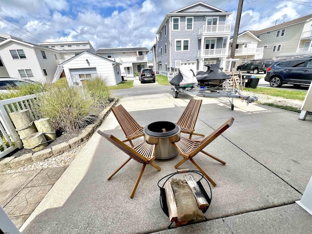 view of patio / terrace featuring a fire pit