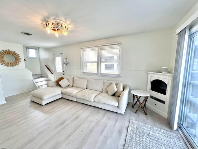 living room featuring light wood-type flooring