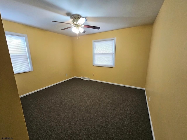 645 Green St, Atlantic City, NJ 08401 - empty room with dark carpet, baseboards, a ceiling fan, and visible vents