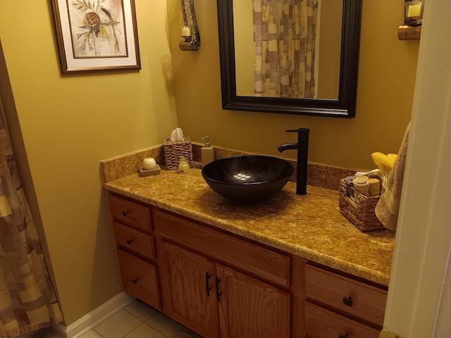 full bathroom with tile patterned flooring and vanity