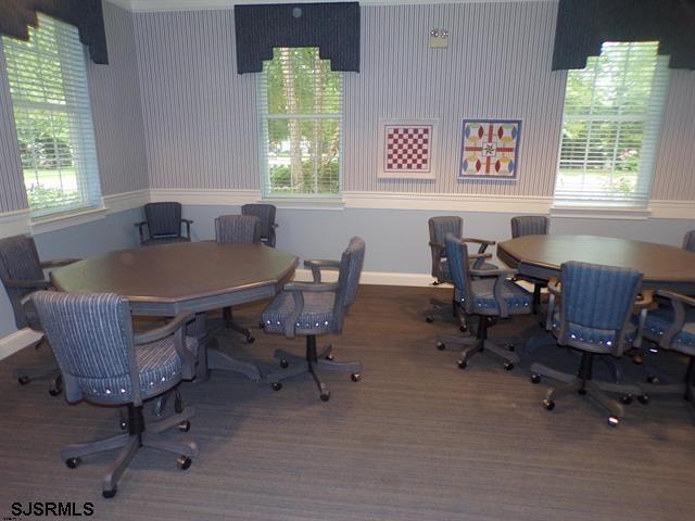 office area featuring hardwood / wood-style flooring and a healthy amount of sunlight