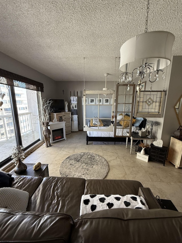 tiled living room featuring a textured ceiling