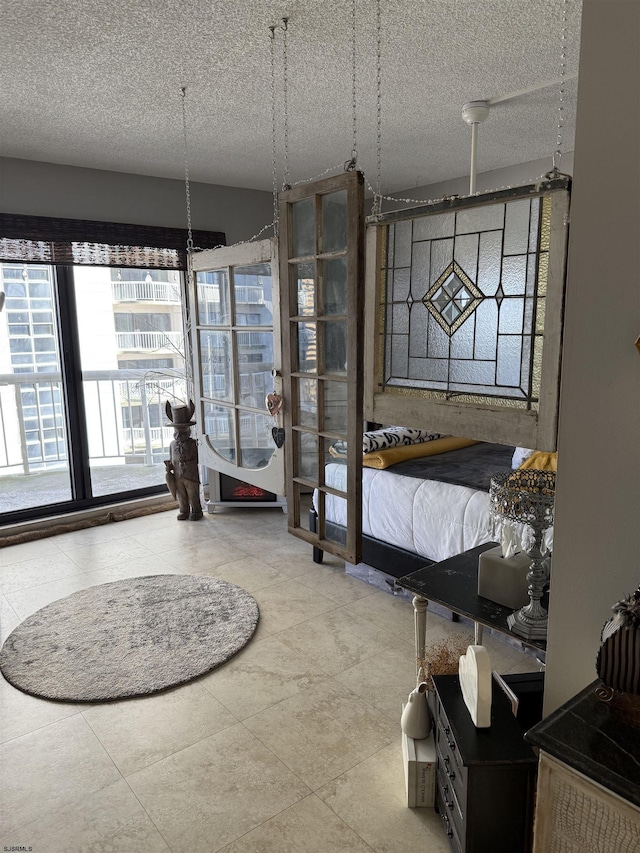 bedroom featuring a textured ceiling