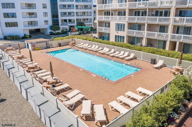 view of pool featuring a patio area