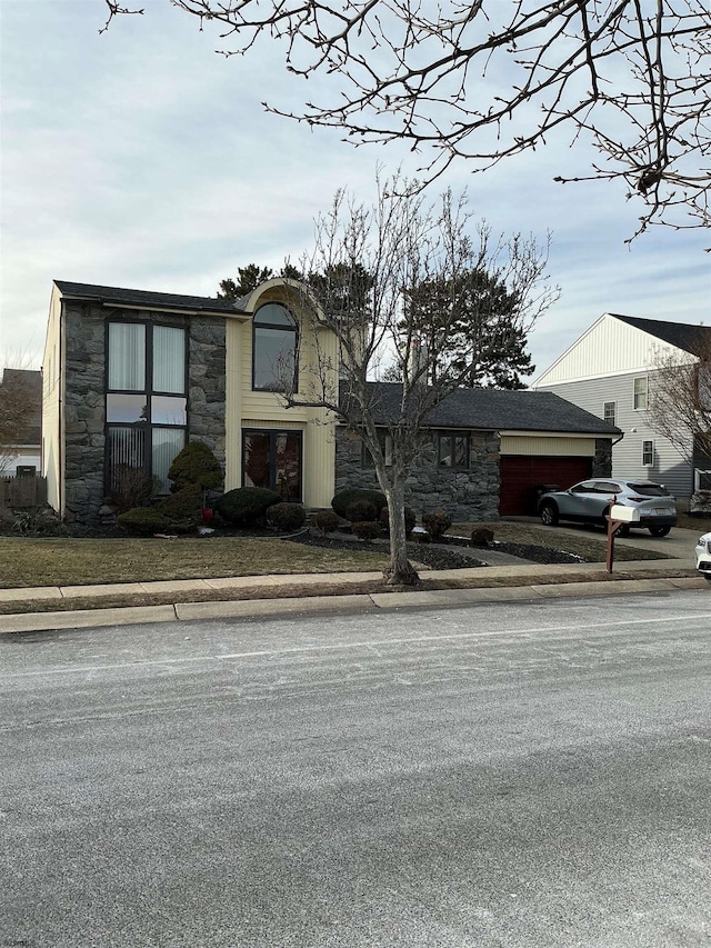 view of front facade featuring stone siding