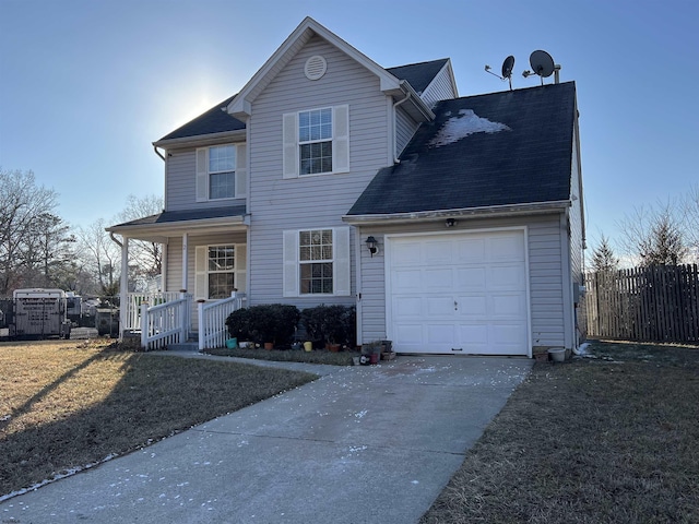 front of property featuring a garage and a porch