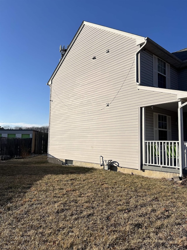 view of home's exterior featuring a yard