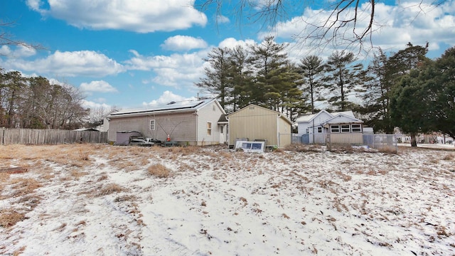 view of snow covered property