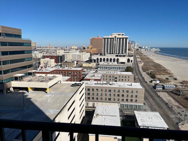 city view featuring a water view and a view of the beach