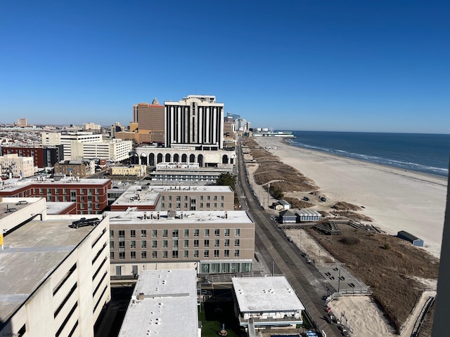 aerial view with a beach view and a water view